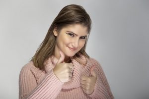 understanding validation - woman giving a thumbs up