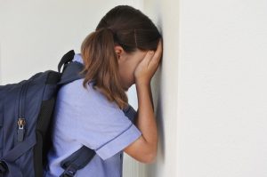 bullying and anxiety - school girl crying